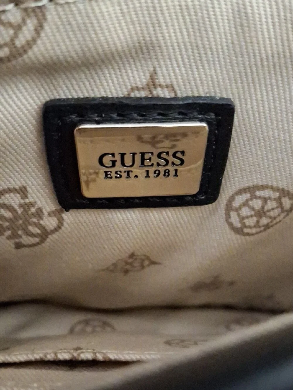 GUESS Black Embossed Leather Shoulder Bag with Gold Chain and Charm Accent